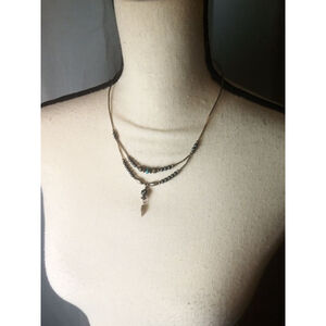 Necklace Black and Copper Beads with a Feather